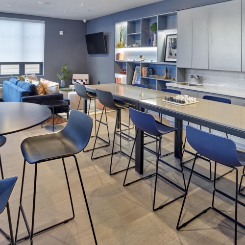 A perfect fit for the whole family community clubhouse kitchen with dining area