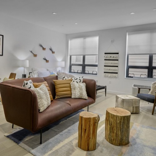 Relax and unwind in well-lit living areas spacious living room and dining area with recessed lighting